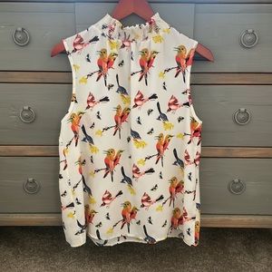 Sleeveless shell/tank with ruffled high neck BIRDS